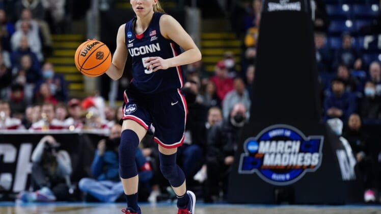 Mar 28, 2022; Bridgeport, CT, USA; UConn Huskies guard Paige Bueckers (5) returns the ball against the NC State Wolfpack during the second half in the Bridgeport regional finals of the women's college basketball NCAA Tournament at Webster Bank Arena. Mandatory Credit: David Butler II-USA TODAY Sports