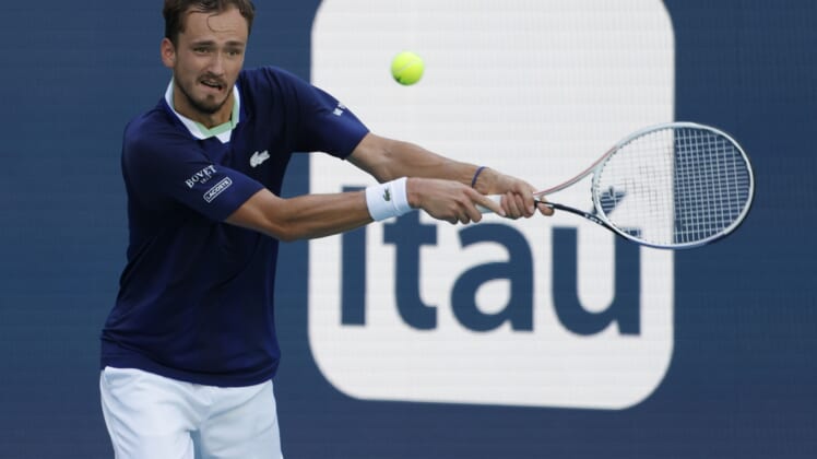 Mar 29, 2022; Miami Gardens, FL, USA; Daniil Medvedev hits a backhand against Jenson Brooksby (USA)(not pictured) in a fourth round men's singles match in the Miami Open at Hard Rock Stadium. Mandatory Credit: Geoff Burke-USA TODAY Sports