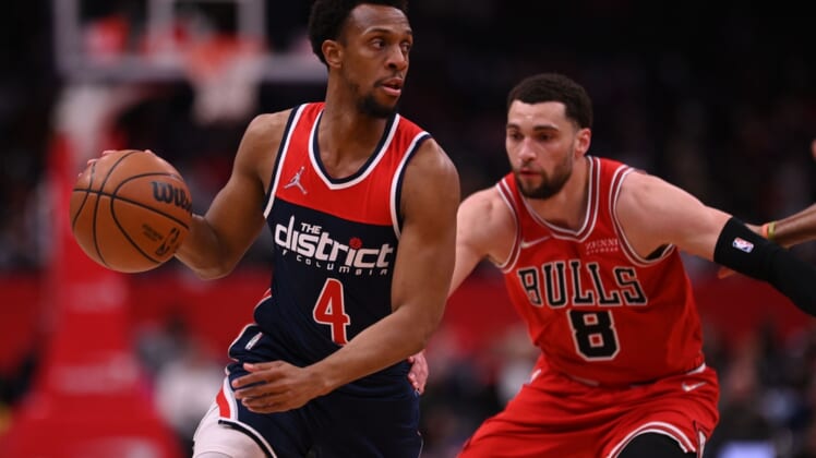 Mar 29, 2022; Washington, District of Columbia, USA;  Washington Wizards guard Ish Smith (4) dribble by Chicago Bulls guard Zach LaVine (8) during the first half at Capital One Arena. Mandatory Credit: Tommy Gilligan-USA TODAY Sports