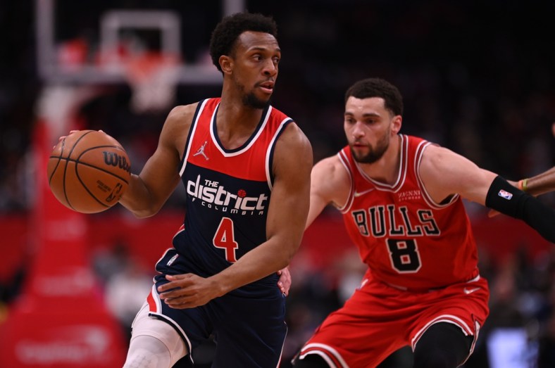 Mar 29, 2022; Washington, District of Columbia, USA;  Washington Wizards guard Ish Smith (4) dribble by Chicago Bulls guard Zach LaVine (8) during the first half at Capital One Arena. Mandatory Credit: Tommy Gilligan-USA TODAY Sports