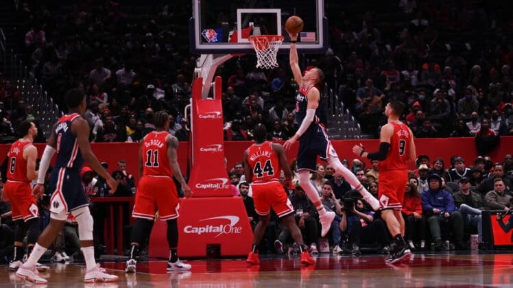 Mar 29, 2022; Washington, District of Columbia, USA;  Washington Wizards center Kristaps Porzingis (6) shoots as Chicago Bulls forward Patrick Williams (44) looks on during the second half at Capital One Arena. Mandatory Credit: Tommy Gilligan-USA TODAY Sports