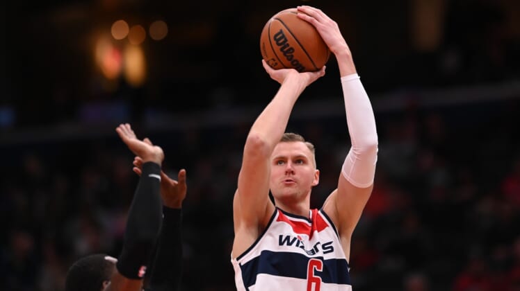 Mar 30, 2022; Washington, District of Columbia, USA;  Washington Wizards center Kristaps Porzingis (6) shoots a jump shot during the first half against the Orlando Magic at Capital One Arena. Mandatory Credit: Tommy Gilligan-USA TODAY Sports