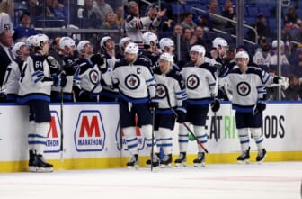 Mar 30, 2022; Buffalo, New York, USA;  Winnipeg Jets right wing Blake Wheeler (26) celebrates his goal during the second period with teammates against the Buffalo Sabres at KeyBank Center. Mandatory Credit: Timothy T. Ludwig-USA TODAY Sports