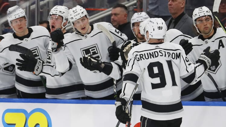 Mar 30, 2022; Edmonton, Alberta, CAN; The Los Angeles Kings celebrate a goal in the second period by forward Carl Grundstrom (91) against the Edmonton Oilers at Rogers Place. Mandatory Credit: Perry Nelson-USA TODAY Sports
