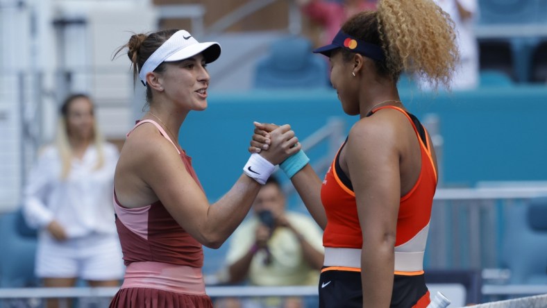 Mar 31, 2022; Miami Gardens, FL, USA; Naomi Osaka (JPN)(R) shakes hands with Belinda Bencic (SUI)(L) after their women's singles semifinal in the Miami Open at Hard Rock Stadium. Mandatory Credit: Geoff Burke-USA TODAY Sports