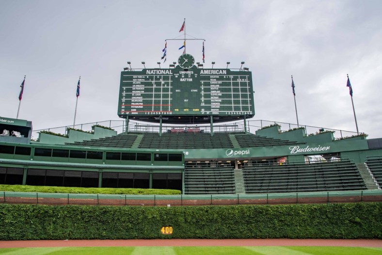 Jun 9, 2018; Chicago, IL, USA; The ivy covered brick outfield wall with the scoreboard is seen prior to a game between the Chicago Cubs and the Pittsburgh Pirates at Wrigley Field. Mandatory Credit: Patrick Gorski-USA TODAY Sports