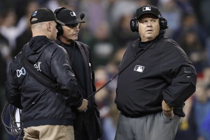 May 21, 2019; Detroit, MI, USA; MLB umpire Fieldin Culbreth (right) looks on during a replay review during the ninth inning in the game between the Detroit Tigers and the Miami Marlins at Comerica Park. Mandatory Credit: Raj Mehta-USA TODAY Sports
