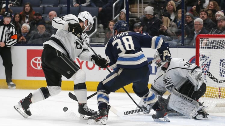 Dec 19, 2019; Columbus, OH, USA; Columbus Blue Jackets center Boone Jenner (38) and Los Angeles Kings center Anze Kopitar (11) battle for the puck during the third period at Nationwide Arena. Mandatory Credit: Russell LaBounty-USA TODAY Sports