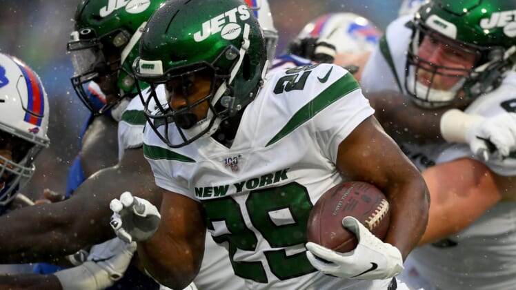 Dec 29, 2019; Orchard Park, New York, USA; New York Jets running back Bilal Powell (29) runs with the ball against the Buffalo Bills during the second quarter at New Era Field. Mandatory Credit: Rich Barnes-USA TODAY Sports