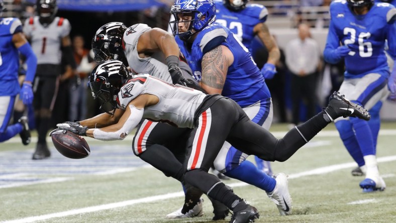 Feb 23, 2020; St. Louis, Missouri, USA; NY Guardians wide receiver Austin Duke (10) dives into the endzone for a touchdown during the second half of an XFL game against the St. Louis Battlehawks at The Dome at America's Center. Mandatory Credit: Billy Hurst-USA TODAY Sports