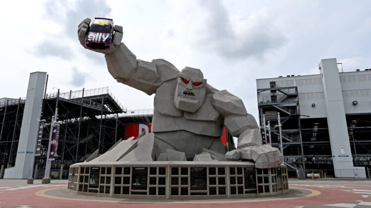 Aug 22, 2020; Dover, Delaware, USA; The statue of "Miles the Monster" out of Dover International Speedway hold a car of NASCAR Cup Series driver Jimmie Johnson (not pictured) before the NASCAR Cup Series race. Mandatory Credit: Peter Casey-USA TODAY Sports