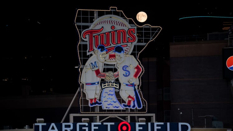 Sep 1, 2020; Minneapolis, Minnesota, USA; A full moon rises over the Minnesota Twins logo in a game between the Minnesota Twins and Chicago White Sox at Target Field. Mandatory Credit: Brad Rempel-USA TODAY Sports