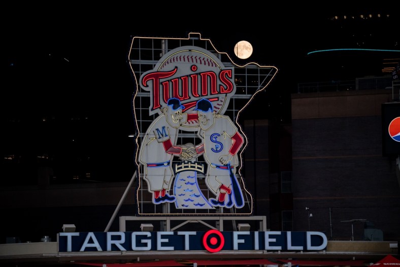 Sep 1, 2020; Minneapolis, Minnesota, USA; A full moon rises over the Minnesota Twins logo in a game between the Minnesota Twins and Chicago White Sox at Target Field. Mandatory Credit: Brad Rempel-USA TODAY Sports