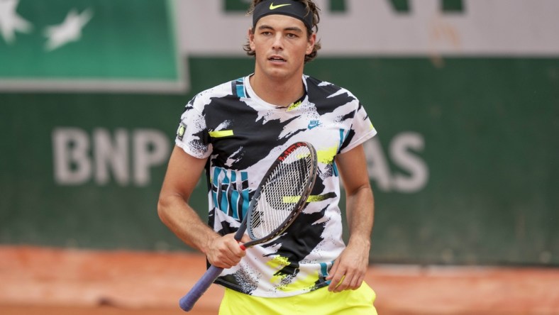 Sep 27, 2020; Paris, France; Taylor Fritz (USA) in action during his match against Tomas Machac (CZE) on day one of the 2020 French Open at Stade Roland Garros. Mandatory Credit: Susan Mullane-USA TODAY Sports