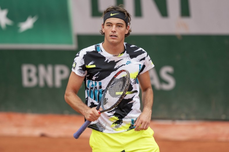 Sep 27, 2020; Paris, France; Taylor Fritz (USA) in action during his match against Tomas Machac (CZE) on day one of the 2020 French Open at Stade Roland Garros. Mandatory Credit: Susan Mullane-USA TODAY Sports