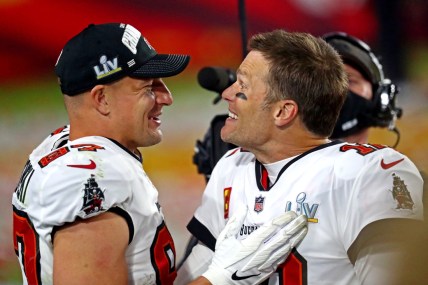 Feb 7, 2021; Tampa, FL, USA;  Tampa Bay Buccaneers quarterback Tom Brady (12) and Tampa Bay Buccaneers tight end Rob Gronkowski (87) celebrate after beating the Kansas City Chiefs in Super Bowl LV at Raymond James Stadium.  Mandatory Credit: Mark J. Rebilas-USA TODAY Sports