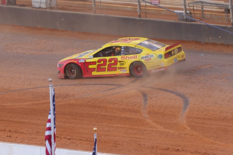 Mar 29, 2021; Bristol, TN, USA; NASCAR Cup Series driver Joey Logano (22) wins the Food City Dirt Race at Bristol Motor Speedway. Mandatory Credit: Randy Sartin-USA TODAY Sports