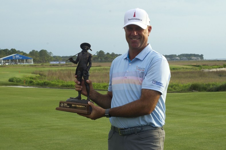 Apr 18, 2021; Hilton Head, South Carolina, USA; Stewart Cink poses with the trophy after winning the 2021 RBC Heritage golf tournament. Mandatory Credit: Joshua S. Kelly-USA TODAY Sports