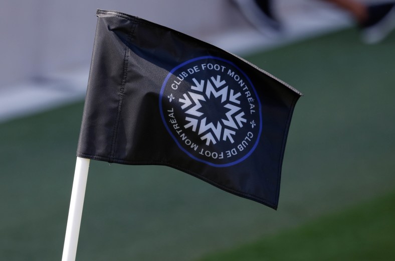 Apr 17, 2021; Fort Lauderdale, FL, Fort Lauderdale, FL, USA;   A detailed view of a corner flag with the logo of CF Montreal on the pitch during the second half between CF Montreal and Toronto FC at DRV PNK Stadium. Mandatory Credit: Rhona Wise-USA TODAY Sports