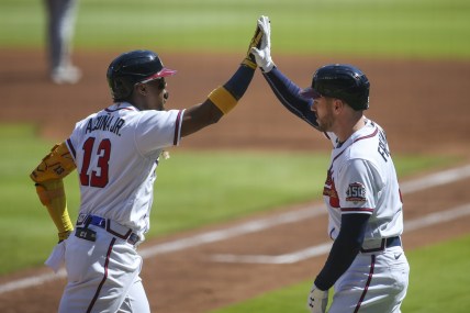 May 22, 2021; Atlanta, Georgia, USA; Atlanta Braves right fielder Ronald Acuna Jr. (13) celebrates after a home run with first baseman Freddie Freeman (5) against the Pittsburgh Pirates in the first inning at Truist Park. Mandatory Credit: Brett Davis-USA TODAY Sports