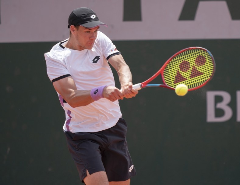 Jun 2, 2021; Paris, France;  Kamil Majchrzak (POL) in action during his match against Casper Ruud (NOR) on day four of the French Open at Stade Roland Garros. Mandatory Credit: Susan Mullane-USA TODAY Sports