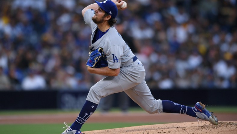 Jun 23, 2021; San Diego, California, USA; Los Angeles Dodgers starting pitcher Trevor Bauer (27) throws a pitch against the San Diego Padres during the first inning at Petco Park. Mandatory Credit: Orlando Ramirez-USA TODAY Sports