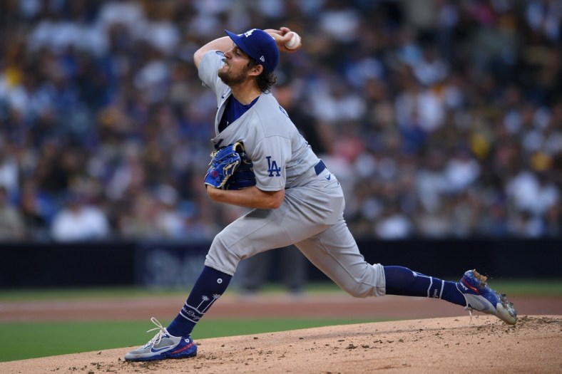 Jun 23, 2021; San Diego, California, USA; Los Angeles Dodgers starting pitcher Trevor Bauer (27) throws a pitch against the San Diego Padres during the first inning at Petco Park. Mandatory Credit: Orlando Ramirez-USA TODAY Sports