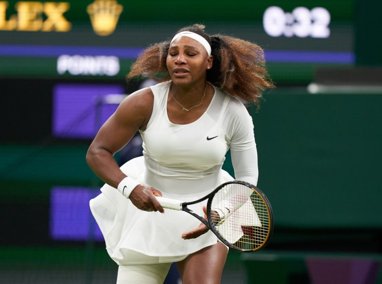 Jun 29, 2021; London, United Kingdom;  Serena Williams (USA) reacts while playing Aliaksandra Sasnovich (BLR) in first round ladies singles on centre court at All England Lawn Tennis and Croquet Club. 
 Mandatory Credit: Peter Van den Berg-USA TODAY Sports