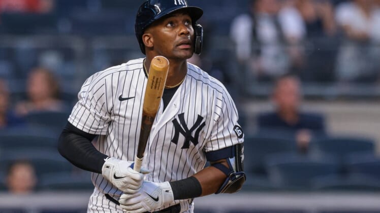 Jun 29, 2021; Bronx, New York, USA;  New York Yankees third baseman Miguel Andujar (41) watches his home run during the fourth inning against the Los Angeles Angels at Yankee Stadium. Mandatory Credit: Vincent Carchietta-USA TODAY Sports