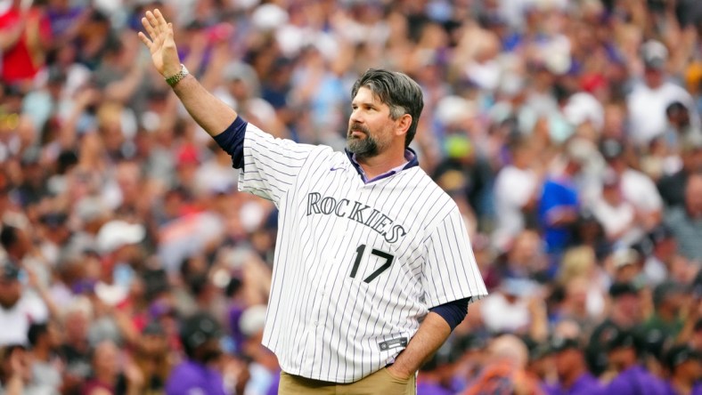 Jul 13, 2021; Denver, Colorado, USA; Colorado Rockies former player Todd Helton throws out the ceremonial first pitch prior to the 2021 MLB All Star Game at Coors Field. Mandatory Credit: Mark J. Rebilas-USA TODAY Sports