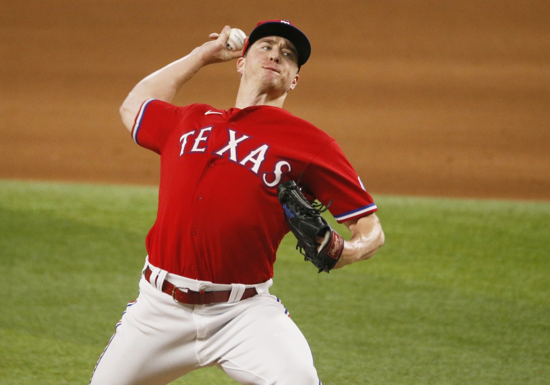 Jul 30, 2021; Arlington, Texas, USA; Texas Rangers relief pitcher Josh Sborz (66) throws to the plate during the ninth inning against the Seattle Mariners at Globe Life Field. Mandatory Credit: Raymond Carlin III-USA TODAY Sports