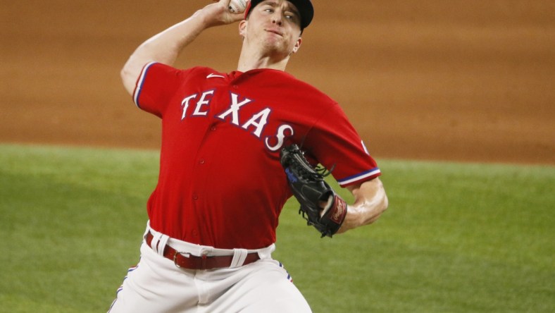 Jul 30, 2021; Arlington, Texas, USA; Texas Rangers relief pitcher Josh Sborz (66) throws to the plate during the ninth inning against the Seattle Mariners at Globe Life Field. Mandatory Credit: Raymond Carlin III-USA TODAY Sports