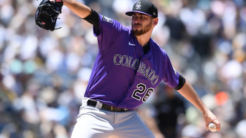 Aug 1, 2021; San Diego, California, USA; Colorado Rockies starting pitcher Austin Gomber (26) throws a pitch against the San Diego Padres during the first inning at Petco Park. Mandatory Credit: Orlando Ramirez-USA TODAY Sports