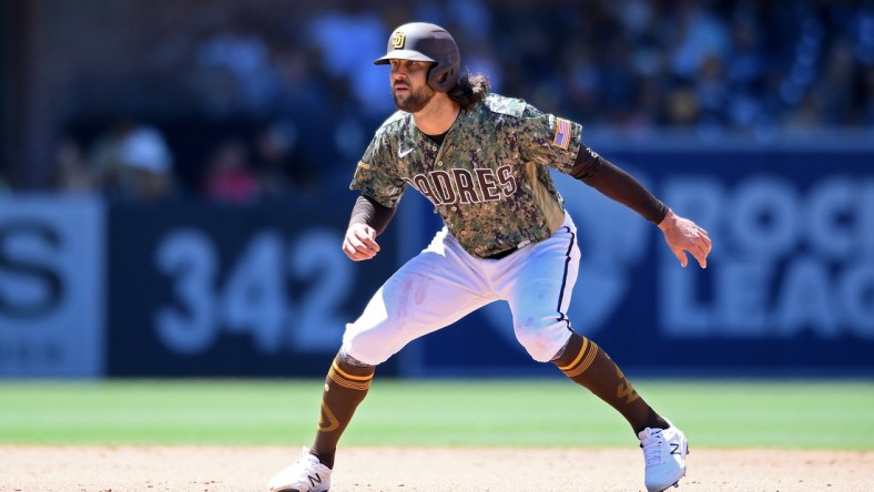 Aug 1, 2021; San Diego, California, USA; San Diego Padres center fielder Jake Marisnick (16) leads off second base during the fourth inning against the Colorado Rockies at Petco Park. Mandatory Credit: Orlando Ramirez-USA TODAY Sports