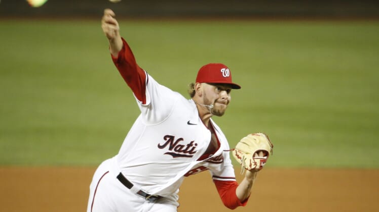 Aug 2, 2021; Washington, District of Columbia, USA; Washington Nationals relief pitcher Gabe Klobosits (68) throws the ball in the ninth inning against the Philadelphia Phillies at Nationals Park. Mandatory Credit: Amber Searls-USA TODAY Sports