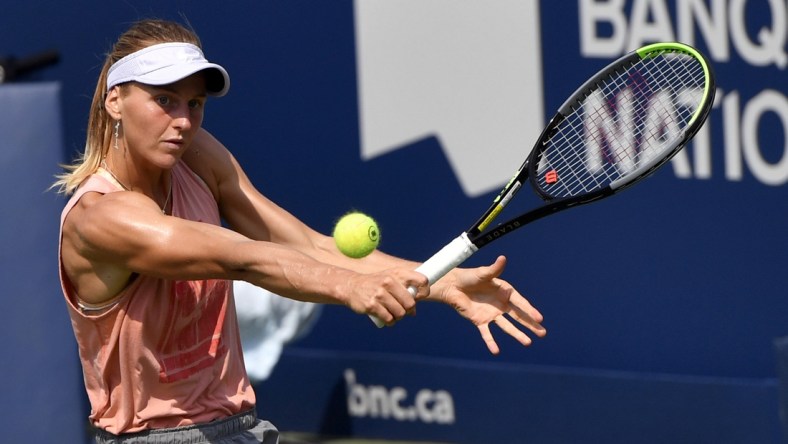 Aug 6, 2021; Montreal, Quebec, Canada; Liudmila
 Samsonova of Russia practices on centre court prior to the start of the National Bank Open at Stade IGA. Mandatory Credit: Eric Bolte-USA TODAY Sports