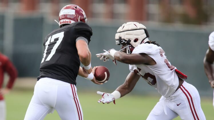 Quarterback Paul Tyson (17) hands off to running back Camar Wheaton (25) during practice for the Crimson Tide Thursday, Aug. 12, 2021.[Staff Photo/Gary Cosby Jr.]Alabama Practice August 12