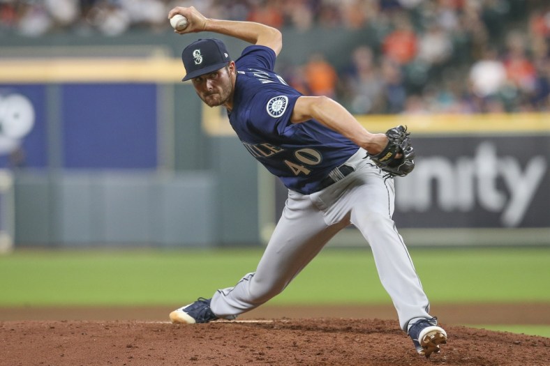 Aug 20, 2021; Houston, Texas, USA;  Seattle Mariners relief pitcher Wyatt Mills (40) pitches against the Houston Astros in the fourth inning at Minute Maid Park. Mandatory Credit: Thomas Shea-USA TODAY Sports
