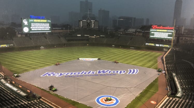 Aug 24, 2021; Chicago, Illinois, USA; The game between the Chicago Cubs and the Colorado Rockies was rained out it will be made up as a doubleheader August 25, 2021 at Wrigley Field. Mandatory Credit: David Banks-USA TODAY Sports