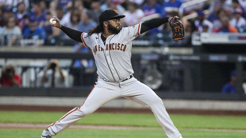 Aug 25, 2021; New York City, New York, USA;  San Francisco Giants pitcher Johnny Cueto (47) pitches in the first inning against the New York Mets at Citi Field. Mandatory Credit: Wendell Cruz-USA TODAY Sports