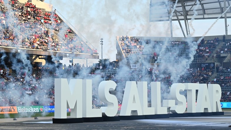 Aug 25, 2021; Los Angeles, CA, USA;   General view of fireworks behind the MLS All-Star display on the pitch before the 2021 MLS All-Star Game at Banc of California Stadium.  Mandatory Credit: Jayne Kamin-Oncea-USA TODAY Sports