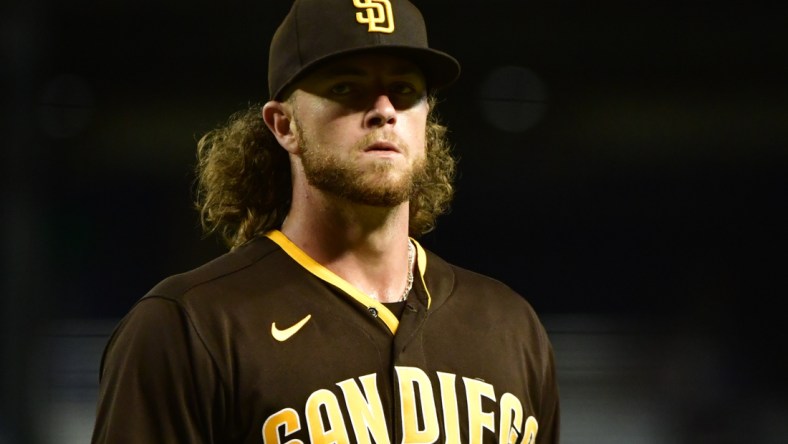 Aug 30, 2021; Phoenix, Arizona, USA;  San Diego Padres pitcher Chris Paddack (59) reacts after pulled from the game in the fifth inning against the Arizona Diamondbacks at Chase Field. Mandatory Credit: Matt Kartozian-USA TODAY Sports