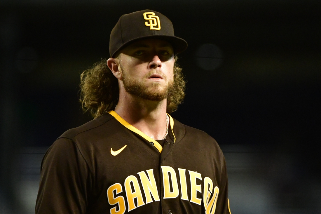 Aug 30, 2021; Phoenix, Arizona, USA;  San Diego Padres pitcher Chris Paddack (59) reacts after pulled from the game in the fifth inning against the Arizona Diamondbacks at Chase Field. Mandatory Credit: Matt Kartozian-USA TODAY Sports