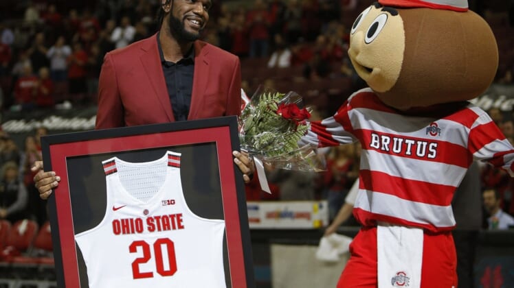 Former OSU basketball player Greg Oden celebrates senior day after graduating from OSU  at Value City Arena March 10, 2019.[Eric Albrecht/Dispatch]