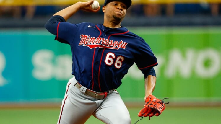 Sep 5, 2021; St. Petersburg, Florida, USA;  Minnesota Twins relief pitcher Jorge Alcala (66) throws a pitch in the sixth inning against the Tampa Bay Rays at Tropicana Field. Mandatory Credit: Nathan Ray Seebeck-USA TODAY Sports