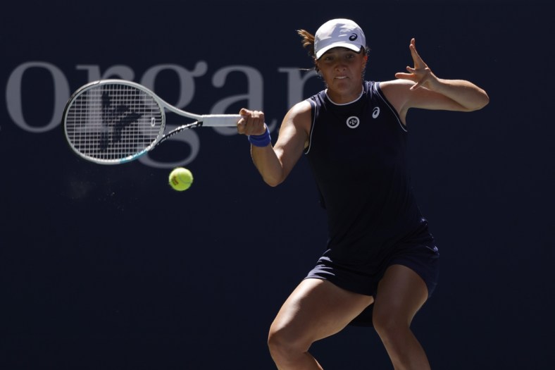 Sep 6, 2021; Flushing, NY, USA; Iga Swiatek of Poland hits a forehand against Belinda Bencic of Switzerland (not pictured) on day eight of the 2021 U.S. Open tennis tournament at USTA Billie Jean King National Tennis Center. Mandatory Credit: Geoff Burke-USA TODAY Sports