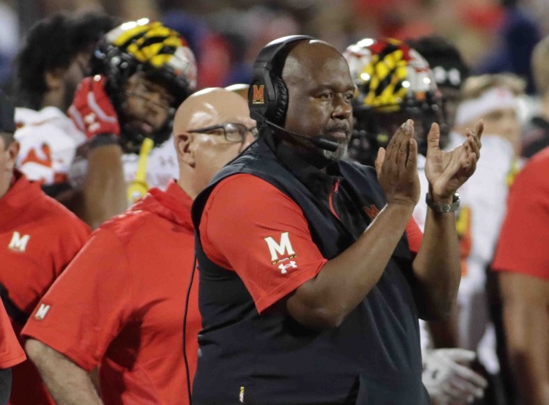Sep 17, 2021; Champaign, Illinois, USA; Maryland Terrapins head coach Mike Locksley looks on from the sideline against the Illinois fighting Illini at Memorial Stadium. Mandatory Credit: Ron Johnson-USA TODAY Sports