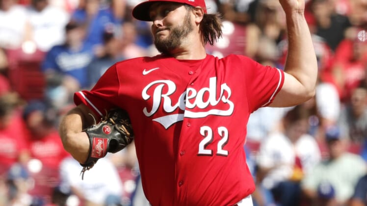 Sep 19, 2021; Cincinnati, Ohio, USA; Cincinnati Reds starting pitcher Wade Miley (22) throws a pitch against the Los Angeles Dodgers during the first inning at Great American Ball Park. Mandatory Credit: David Kohl-USA TODAY Sports