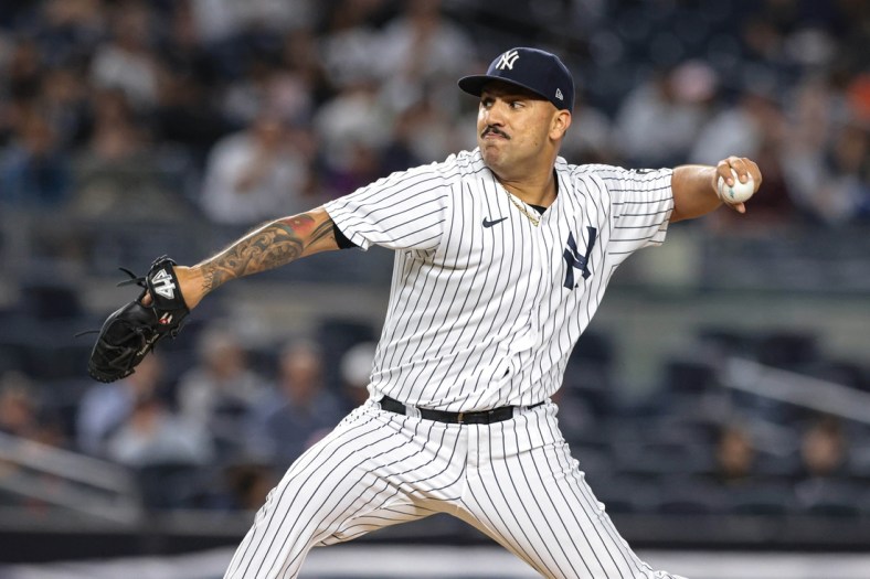 Sep 20, 2021; Bronx, New York, USA; New York Yankees starting pitcher Nestor Cortes Jr. (65) delivers against the Texas Rangers during the third inning at Yankee Stadium. Mandatory Credit: Vincent Carchietta-USA TODAY Sports