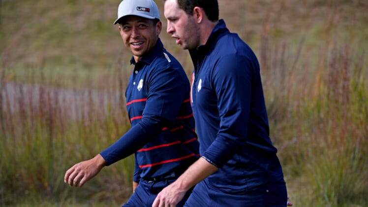 Sep 24, 2021; Haven, Wisconsin, USA; Team USA player Xander Schauffele and Team USA player Patrick Cantlay on the 15th hole during day one four ball matches for the 43rd Ryder Cup golf competition at Whistling Straits. Mandatory Credit: Orlando Ramirez-USA TODAY Sports